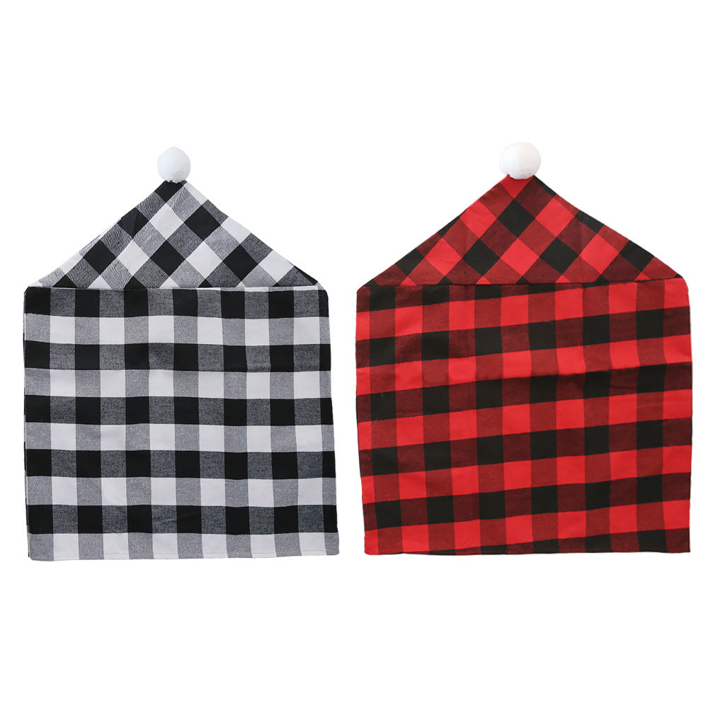 New home decor items for Christmas season, featuring red and black checkered patterns with white fur balls. Chair covers for Christmas atmosphere decoration